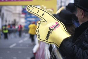 An image of a London Landmarks branded foam finger pointing out into the runners, encouraging them during the event